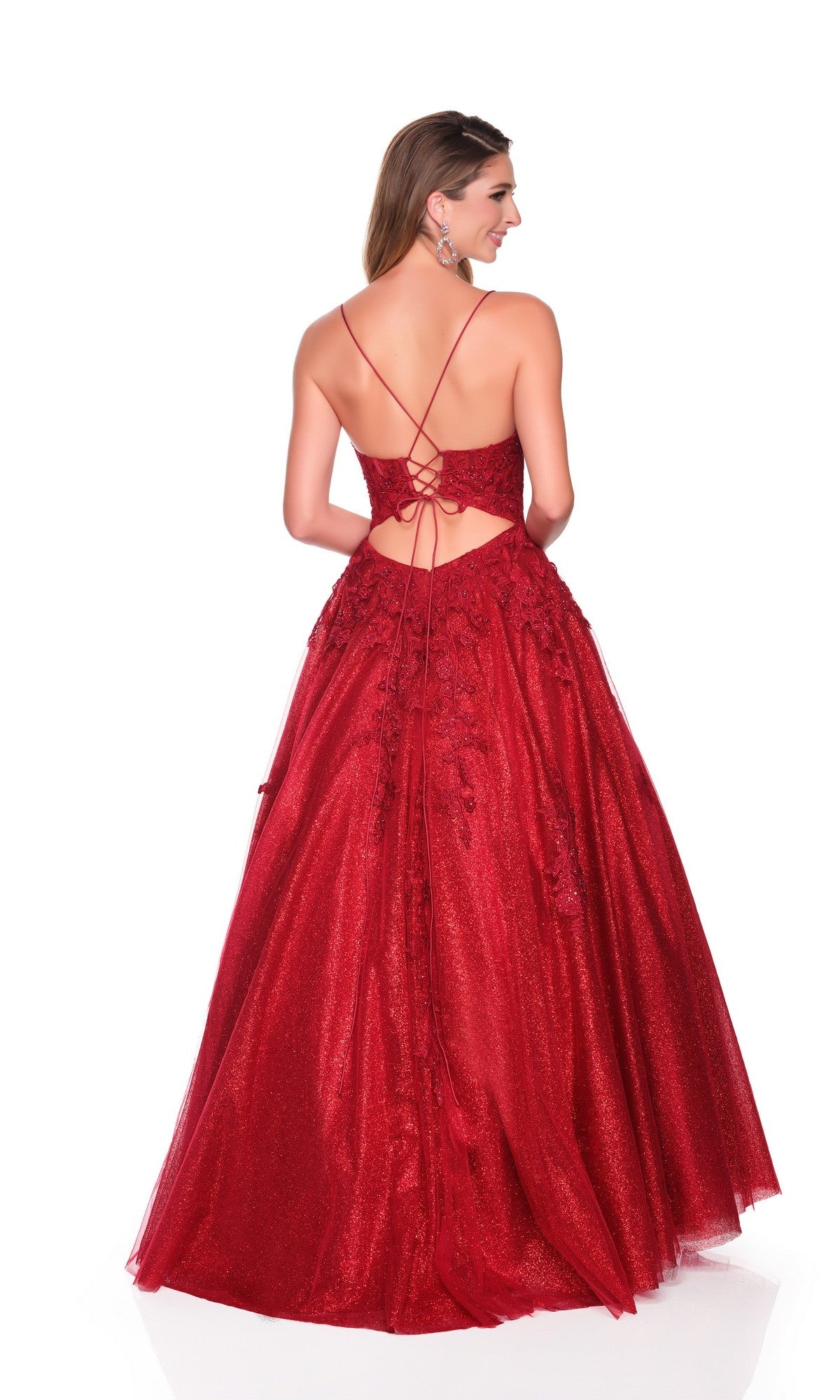 A woman, shown from behind against a white background, wears the Dave and Johnny 12727 long prom dress: a sparkly red gown with an embroidered bodice, lace-up back, and spaghetti straps.